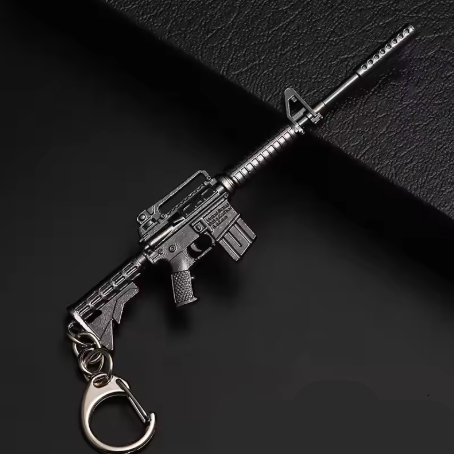 Llavero de pistola de juguete - Modelo en miniatura de aleación